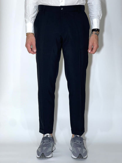 Pantalón pitillo sastrería talle alto 5 cm y abotonadura semilateral