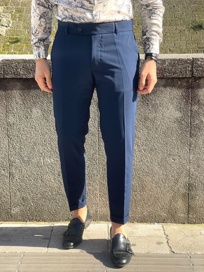 Pantalón pitillo sastrería talle alto 5 cm y abotonadura semilateral