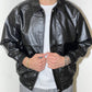 Jacket in pelle anni 80 con collo e cerniera a scomparsa
